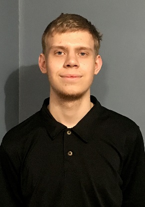 A person posing for the camera Description automatically generated